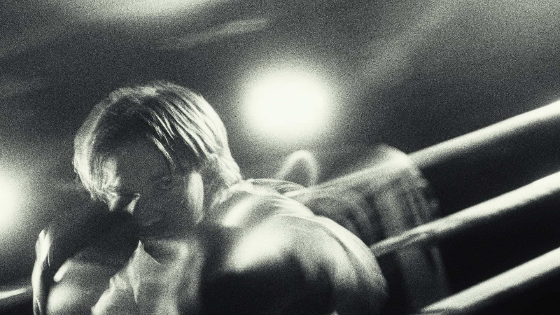 Boxer in the ring under hard light, from Dark Desire